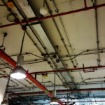 Sprinkler system protected with corrosion inhibiting additive for long-term rust prevention