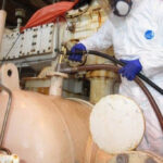 Foggable application of ZERUST Axxatec 85-F on an offshore gas system, showcasing the water-based VCI rust preventative's protective coverage.