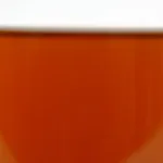 ZERUST Axxatec 87-M ready-to-use dark amber Foggable water-based rust preventative liquid in application, showcasing its safe, thin, dry-to-touch coating for metal protection.