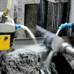Close-up of cutting process using metalworking fluid additive for hard water treatment.