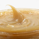 Viscosity demonstration of ZERUST Axxanol Z-Maxx anti-corrosion grease, showcasing its thick NLGI 2 grade.