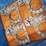 Parts interleaved with ZERUST VCI paper and wrapped in Multimetal VCI Film