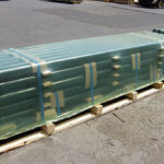 Long metal pipes prepared for shipment with ICT510-SRK