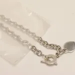 Silver necklace in poly bag demonstrating the effectiveness of anti-tarnish film.