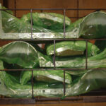 Car frames packaged in ZERUST ICT520-HS High-Strength VCI Film during shipment.