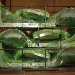 Car frames packaged in ZERUST ICT520-HS High-Strength VCI Film during shipment.