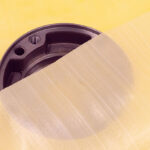 Metal part covered with VCI Plastic Scrim showcasing strength