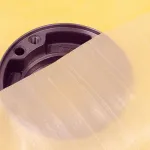 Metal part covered with VCI Plastic Scrim showcasing strength