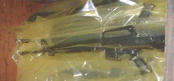 Automatic rifles in ZERUST Bags within shipping crate for secure transport