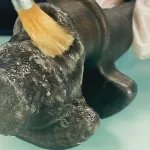 Applying ZERUST AxxaClean 2048 Safe Rust Remover on rusty metal