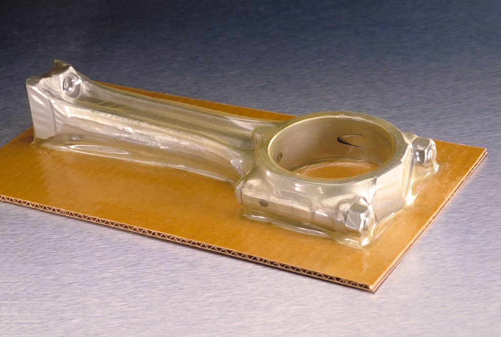 Connecting rod secured with VCI skin film on board