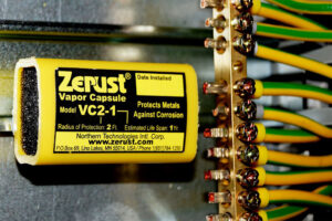 ZERUST VC2-1 Vapor Capsule installed in an electrical cabinet for corrosion prevention