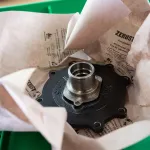 Metal part wrapped in VCI Kraft Paper for corrosion protection