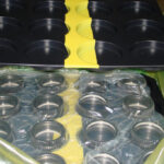 Returnable dunnage tray over packaged components with ZERUST ICT520-CSL.