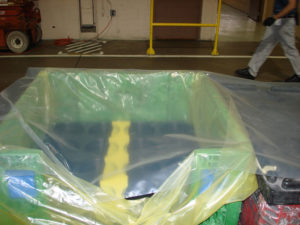 Crate lined with ZERUST Cold Seal VCI Film, highlighting efficient packing.