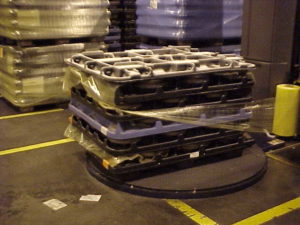 Pallet wrapped in VCI stretch film by machine for secure packaging