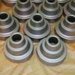 Cast parts interleaved with VCI Kraft Paper for shipping protection