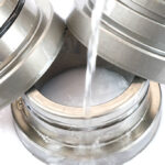 Applying ZERUST® Axxanol™ 33CD, a dry-to-touch rust preventative, to protect machined metal parts.