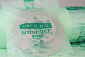 Close-up of roll of Natur-VCI film with rotor, highlighting biodegradable and compostable packaging technology.