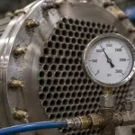 Pressure gauge during hydrostatic testing with hydrostatic corrosion prevention treatment