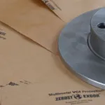 Close-up of brake rotor on Poly VCI Kraft Paper for corrosion protection