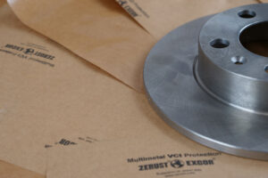 Close-up of brake rotor on Poly VCI Kraft Paper for corrosion protection