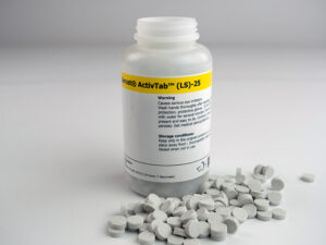 ZERUST ActivTab(LS) flash corrosion VCI tablets shown with bottle for scale