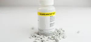 Bottle and tablets of ZERUST ActivTab(LS) displayed on table
