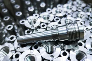 Close-up of steel rods cleaned with part cleaner for a precision finish.