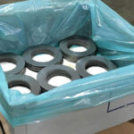 Metal components coated with ZERUST Axxanol A35CD-7 and packaged in ZERUST ICT VCI for enhanced corrosion resistance.