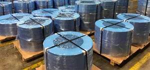 Metal coils in storage showcasing effective corrosion protection