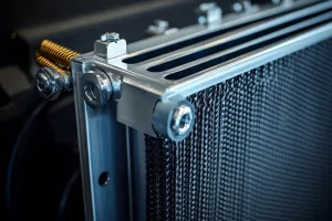 Close-up of aluminum radiator cleaned with aluminum part cleaner for industrial applications.