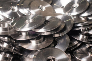 CNC-milled parts treated with Axxatec 48C for corrosion prevention.