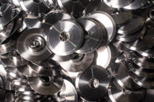 Overhead view of milled parts coated with water-based aluminum rust preventative.