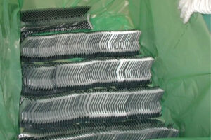 Stamped parts ready for shipment, wrapped in ZERUST flame retardant VCI film