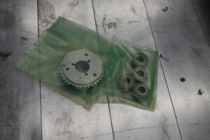 Gear and bearings packaged in a Flat VCI Bag for corrosion protection.