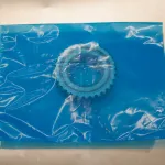 Small metal gear secured inside a ZERUST Flat VCI Bag.
