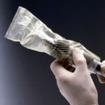 The process of securing a metal component for long-term storage.