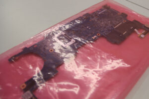 Circuit board securely wrapped in ZERUST ICT510-ATS Anti-Static VCI Film for shipment.