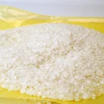 Close-up of 30% recycled polyethylene resin pellets used in ZERUST ICT510-PCR30 PCR VCI Film manufacturing.