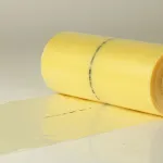Yellow film roll designed for protecting metal components.