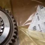 ZERUST ZDC paired with ICT510-C VCI film, encasing a metal gear to prevent corrosion and moisture damage.