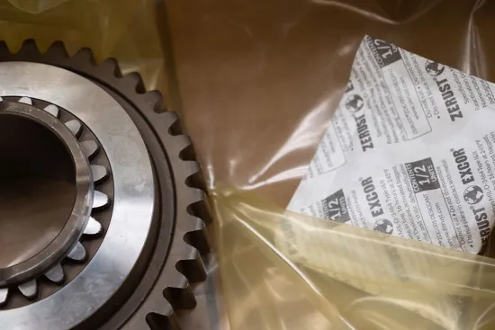 ZERUST ZDC paired with ICT510-C VCI film, encasing a metal gear to prevent corrosion and moisture damage.
