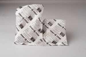 1 unit and 1/2 unit ZERUST ZDC Desiccant packs displayed together for size comparison.