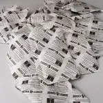 Close-up view of 1 unit and 1/2 unit ZERUST ZDC Desiccants, emphasizing size differences and packaging material.