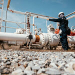 Field technician overseeing application of hydrotesting fluid additive during pressure test.