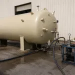 Pressure vessel undergoing hydrostatic testing with hydrotesting fluid additive