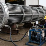 Heat exchanger undergoing hydrostatic testing with hydrotesting fluid additive