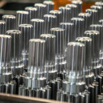Metal parts coated with non-staining rust preventive oil during production.