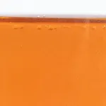 Amber-colored ZERUST Axxanol 758-NV in a close-up view.